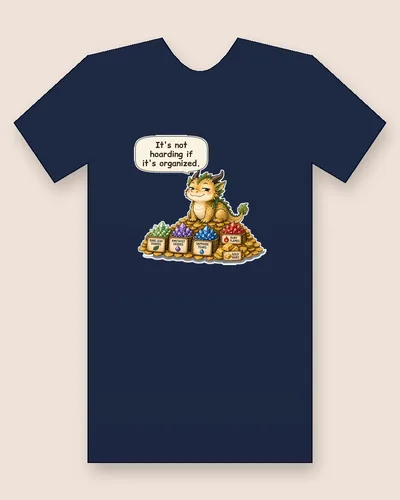 Dragon tee mockup: A small golden dragon sitting on labeled bins of gems and gold coins, saying “It's not hoarding if it's organized.”